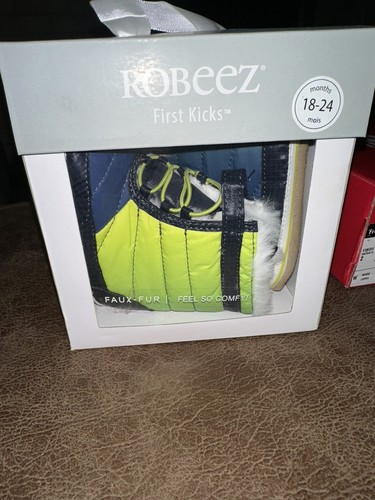 Robeez first kicks snow - first,
